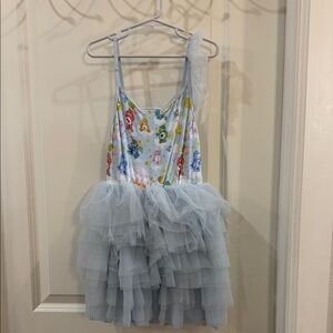 GUC. Missing tulle on one sleeve.